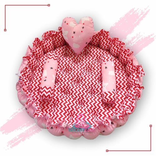 Round Baby Tub Bed With A Heart Pillow And Pair Of Bolster Pink And Red 1
