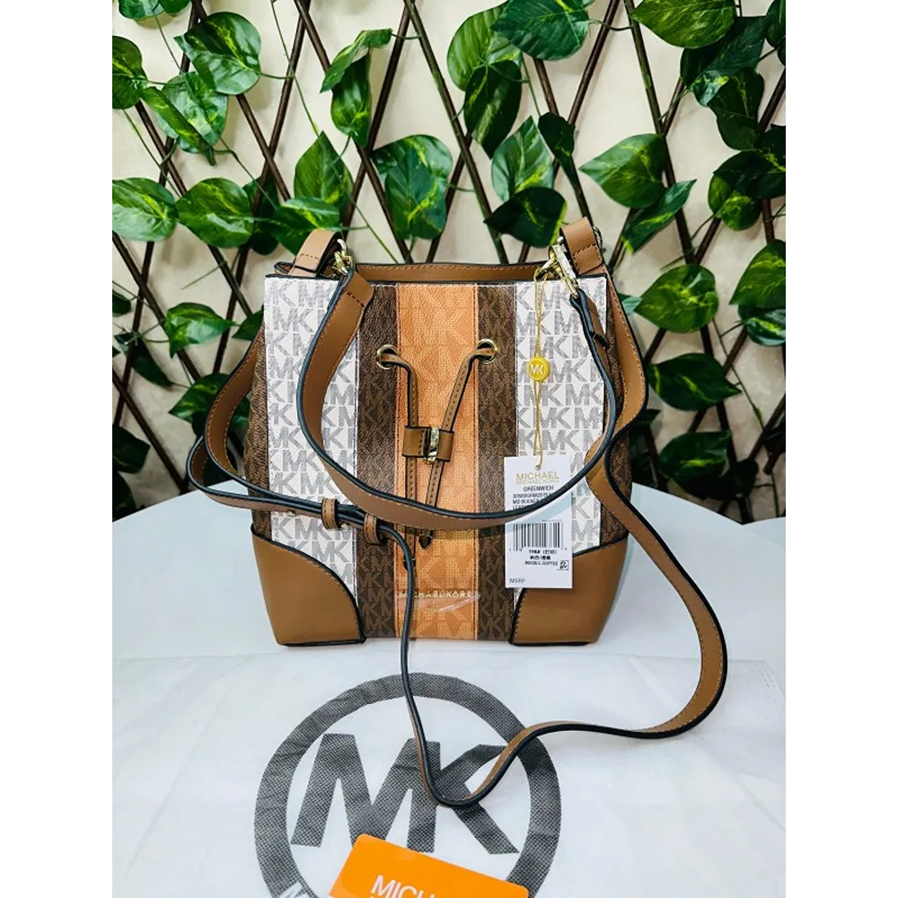Michael Kors bucket bag. Medium sized and comes with... - Depop